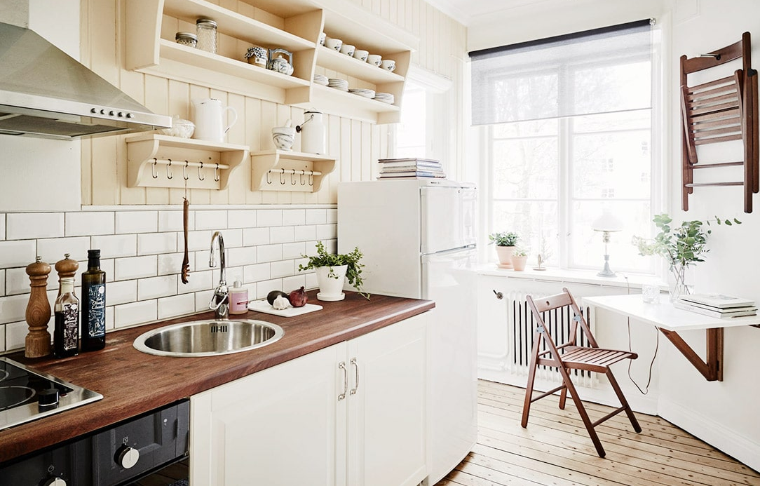 Почему стоит выбрать угловой кухонный гарнитур в маленькую кухню