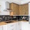 Только не плитка: 9 идей для отделки кухонного фартука